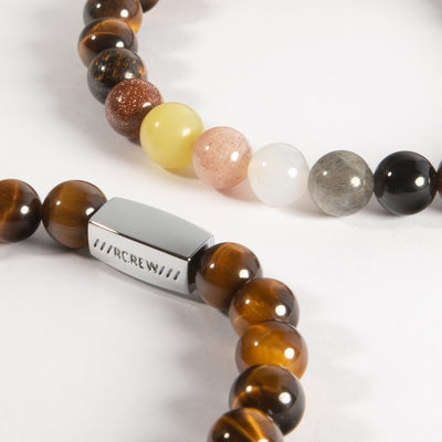 Close-up of bear pride semi-precious bracelet showing bear flag gemstone beads and RCREW clasp, 8mm