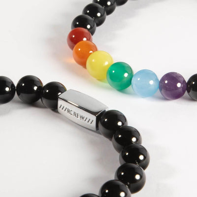 Two semi-precious rainbow pride bracelets stacked together showing gemstone beads, 8mm