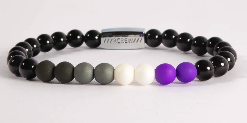 Asexual bracelet in the colours of the Asexual pride flag: black, grey, white and purple
