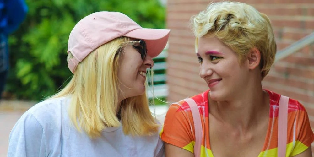 Two lesbians looking lovingly at each other